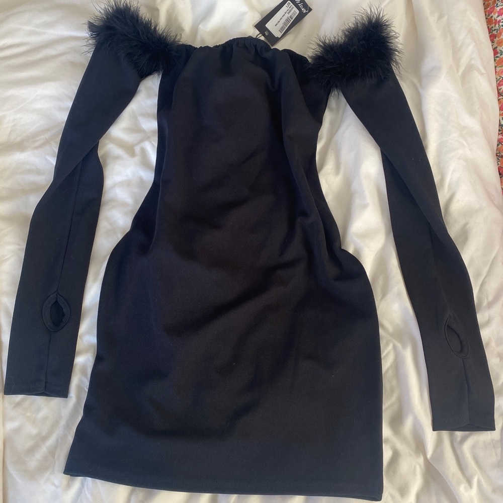 Gorgeous black mini dress with faux fur